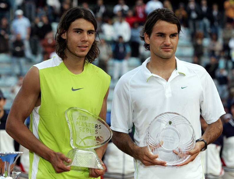 Poi cinque vittorie consecutive di Nadal, tra cui il Roland Garros del 2005. Qui i due agli Internazionali d&#39;Italia, vinti da Rafa. Ap